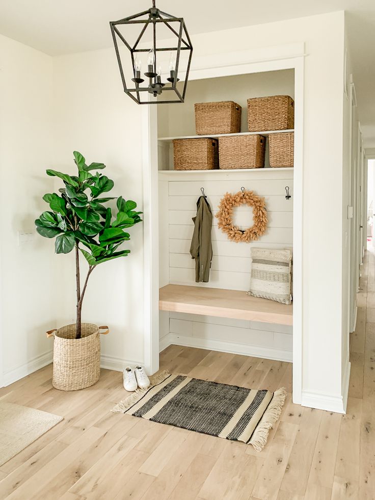 the entryway is clean and ready for us to use as a storage area in this home