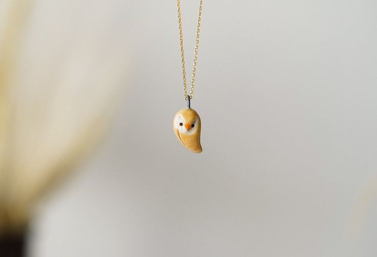 This handmade ceramic necklace is made of stoneware clay, hand shaped without any mold. Necklace is light and comfortable to wear. Glazed on both sides. The chain is 18K gold plated 925 silver. It will arrive gift wrapped, ready to give as a gift or keep for yourself. Due to its handmade nature it is a unique piece. Each item is made one by one at hand with much love and care. The making of ceramic has too many stages. First clay gets its form, the object is let to dry a few days, then imperfect Unique Clay Necklace For Gifts, Unique Clay Necklaces For Gifts, Unique Clay Necklace For Gift, Unique Gold Polymer Clay Necklace, Gold Polymer Clay Pendant Necklace, Gold Pendant Necklace In Polymer Clay, Handmade Gold Clay Jewelry, Clay Hand, Ceramic Heart