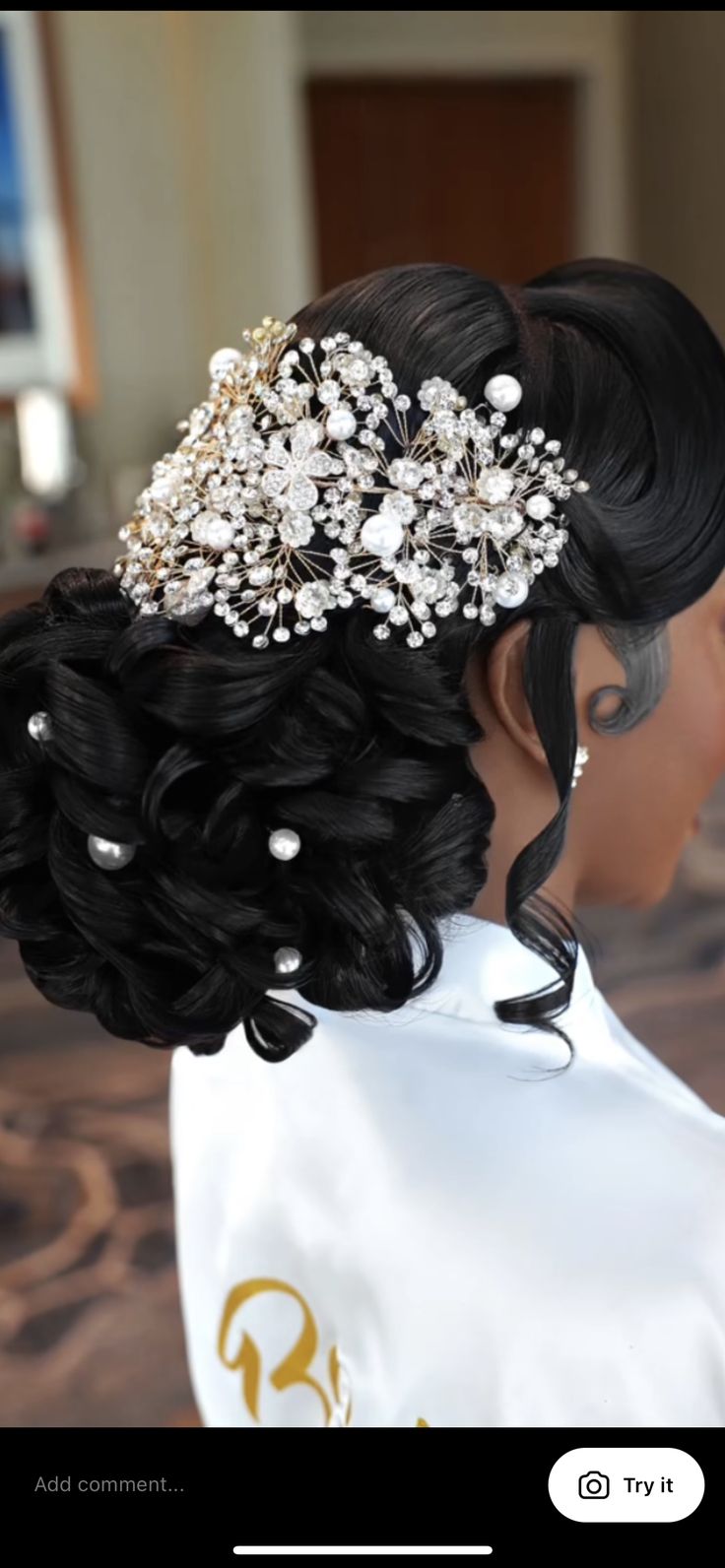 a woman wearing a wedding hair comb with pearls