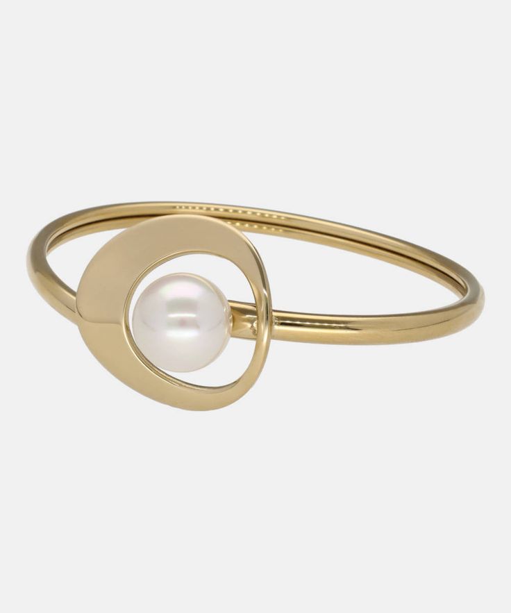 Elevate your style with our Petra Collection bracelet - a luxurious bangle crafted with a 46x58mm gold-plated steel band and a lustrous 12mm round organic pearl. This elegant piece will add a touch of sophistication to any outfit, making it a must-have for every fashionable woman. Modern Gold-tone Bangle Bracelets, Modern Gold-tone Round Bracelets, Modern Matte Gold Bangle Bracelet, Elegant Metal Bangle Pearl Bracelet, Modern Gold-tone Bangle With Polished Finish, Elegant Matte Gold Bracelets For Formal Occasions, Yellow Gold Stainless Steel Bangle Jewelry, Modern Gold-tone Bracelet As A Gift, Modern Gold-tone Gold Bracelet As A Gift