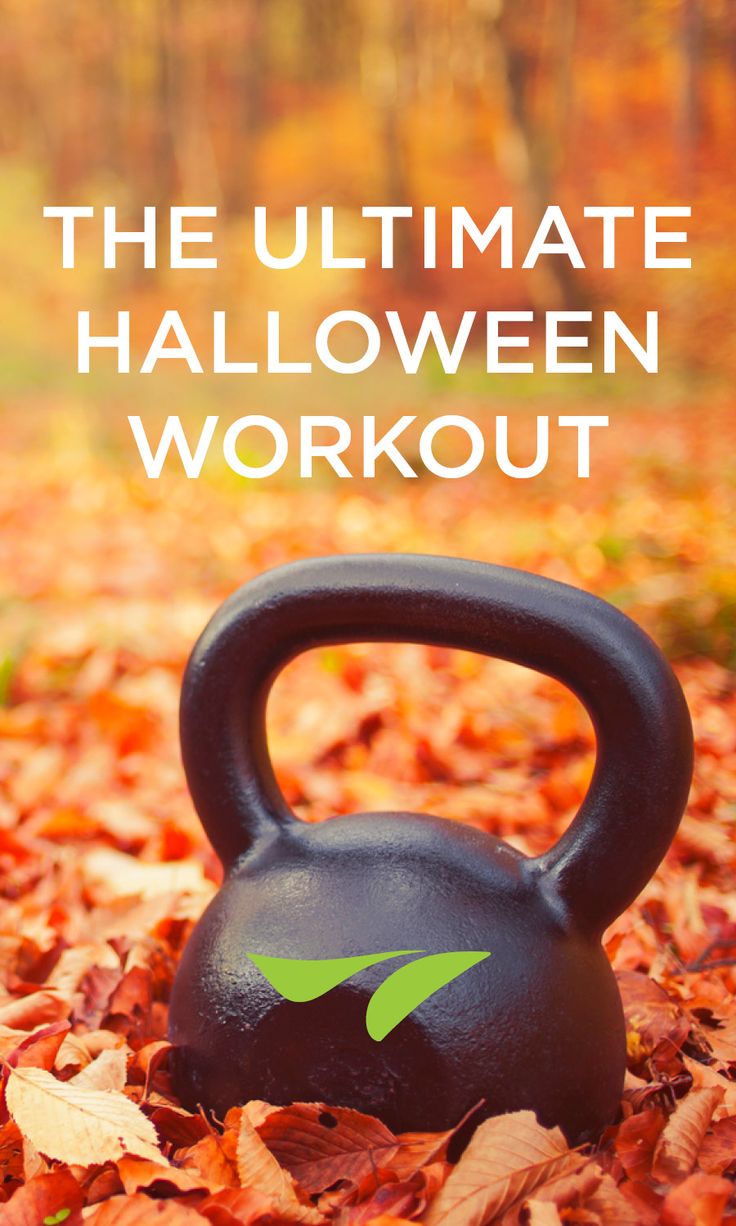 a kettle with the words, the ultimate halloween workout on it in front of leaves