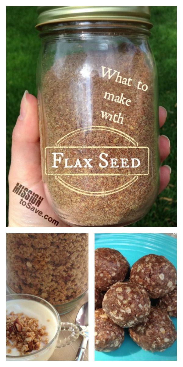 a person holding a jar filled with granola next to a bowl of cereal and spoon