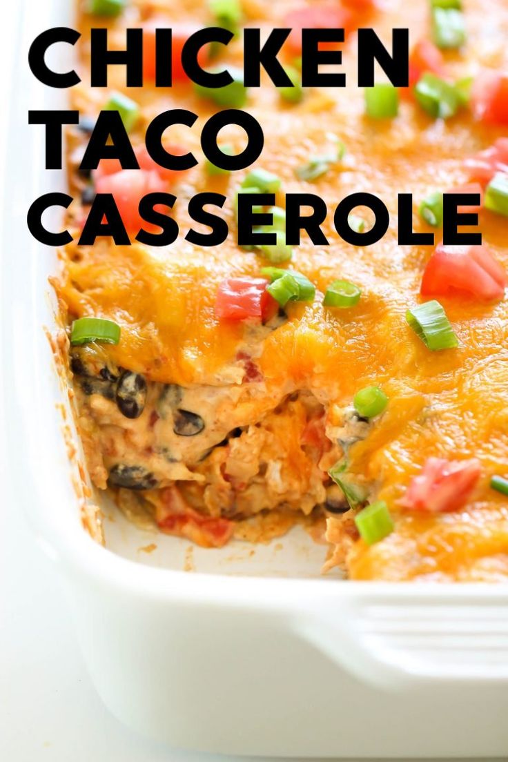 chicken taco casserole in a white baking dish