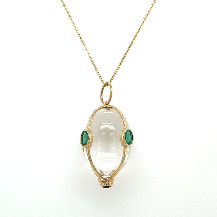 14kt yellow gold quartz egg with four oval emeralds. Chain sold separately. Luxury Bohemian Oval Jewelry, Luxury 22k Gold Oval Jewelry, Luxury Bohemian Oval Gemstones, Contemporary Luxury Oval Jewelry, Luxury Traditional Oval Jewelry, Luxury Contemporary Oval Jewelry, Luxury Oval Fine Jewelry Gemstones, Luxury Hammered Oval Pendant Jewelry, Sweet Disposition