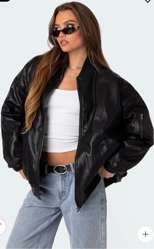 Make a bold statement with this Edikted faux leather oversized bomber jacket in black. The jacket features a zip closure, long sleeves, and a comfortable oversized fit. The outer shell material is made of high-quality faux leather, ensuring a stylish and durable look. This jacket is perfect for any occasion and can be hand washed easily to maintain its quality. The black color and bomber jacket style make it a versatile addition to any wardrobe. It is available in size large and is designed for Hailey Bieber Jacket Outfit, Black Leather Jacket Princess Polly, Cool Leather Jackets, Baseball Jacket Outfit Aesthetic, Black Jacket Outfit Women, Black Lether Jacket, La Fashion Los Angeles Street Style, Black Leather Jacket Outfit Women, Bomberjacket Streetstyle