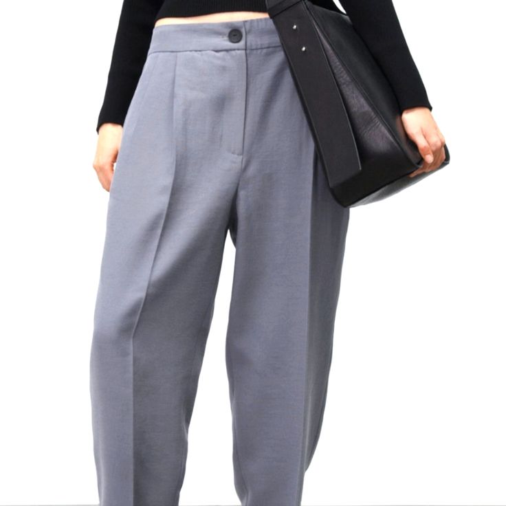 High Waist Pants With Pleats And Front Pockets. Front Zip And Button Closure. Ankle-length Business Casual Pants With Buttons, Baggy Ankle-length Dress Pants For Work, Baggy Pants For Workwear, Gray Ankle-length Pants For Business Casual, Chic Gray Pants For Workwear, Gray Ankle-length Business Casual Pants, Chic Gray Pants For Work, Tailored Gray Trousers, Gray Tailored Trousers