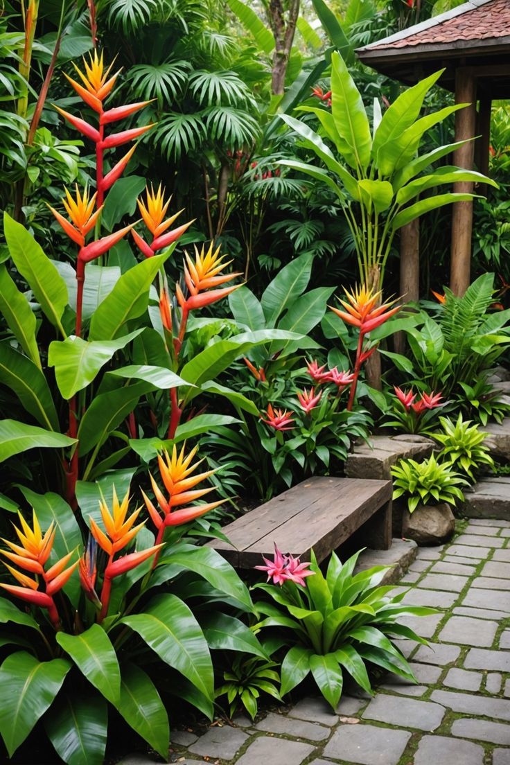 tropical garden with colorful flowers and greenery in the foreground, on brick walkway