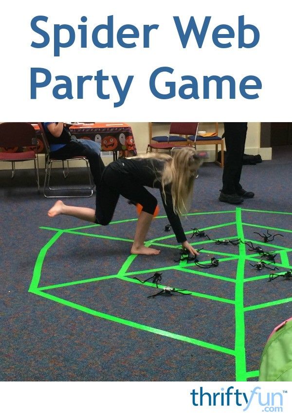 two children playing with spider web party game