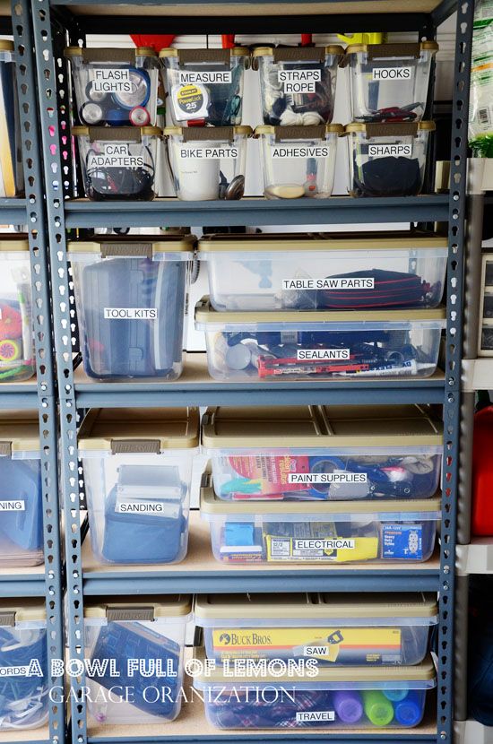 the shelves are filled with many different types of containers and bins for storing items