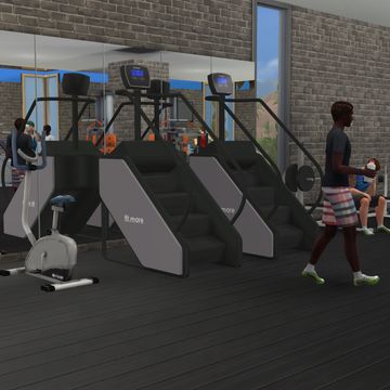 a group of people running on treadmills in a gym