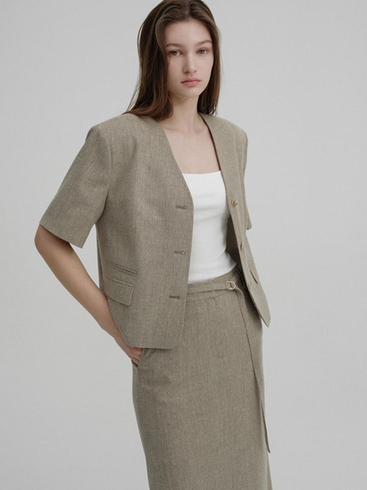 This is a trendy and minimal jacket by AVA MOLLI that is made out of high quality and sturdy material. With distinctive mood of the design and feminine look, you can style it for your trendy and refined daily outfit.- Welt pocket detail on the side- Relaxed slim silhouette- Set up with matching skirt and pants Elegant Khaki Outerwear For Business Casual, Elegant Khaki Business Casual Outerwear, Beige Outerwear With Pockets For Office, Structured Beige Blazer With Hidden Button Closure, Beige Structured Blazer With Hidden Buttons, Beige Structured Blazer With Hidden Button Closure, Modern Structured Beige Outerwear, Modern Beige Outerwear For Spring, Cream Linen Outerwear For Work