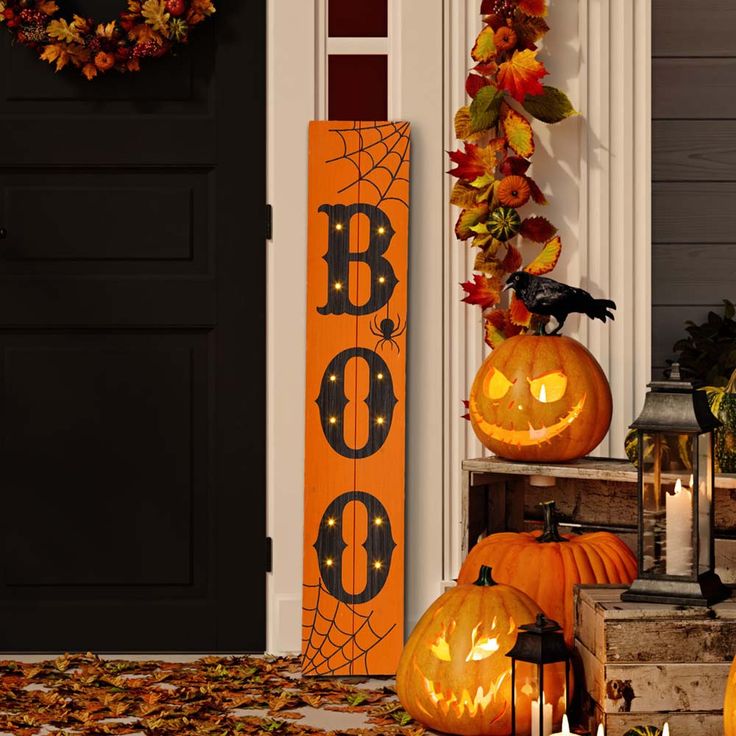 halloween decorations with pumpkins and jack o lanterns