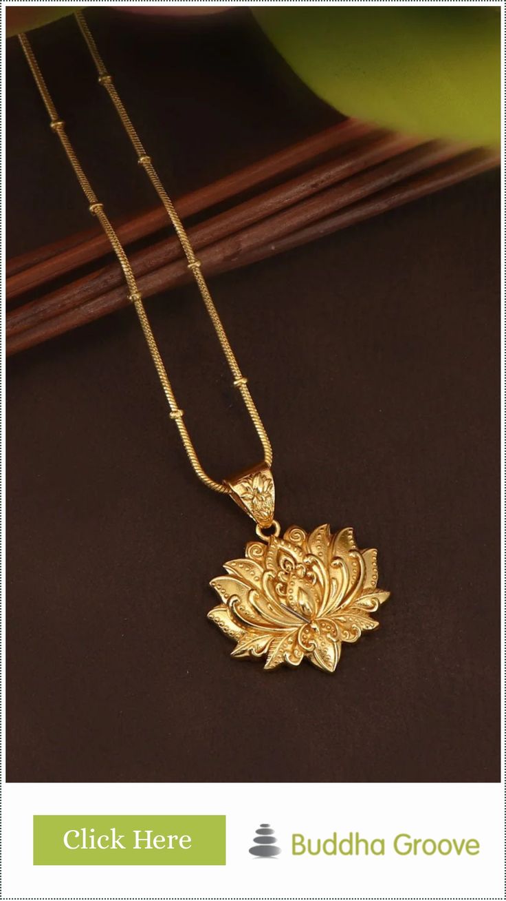 Golden lotus-shaped pendant on a gold chain displayed on a dark background. Lotus Flower Pendant, Blooming Lotus, Lotus Necklace, Lotus Earrings, Meaningful Jewelry, The Lotus, Brass Necklace, In Full Bloom, Flower Pendant