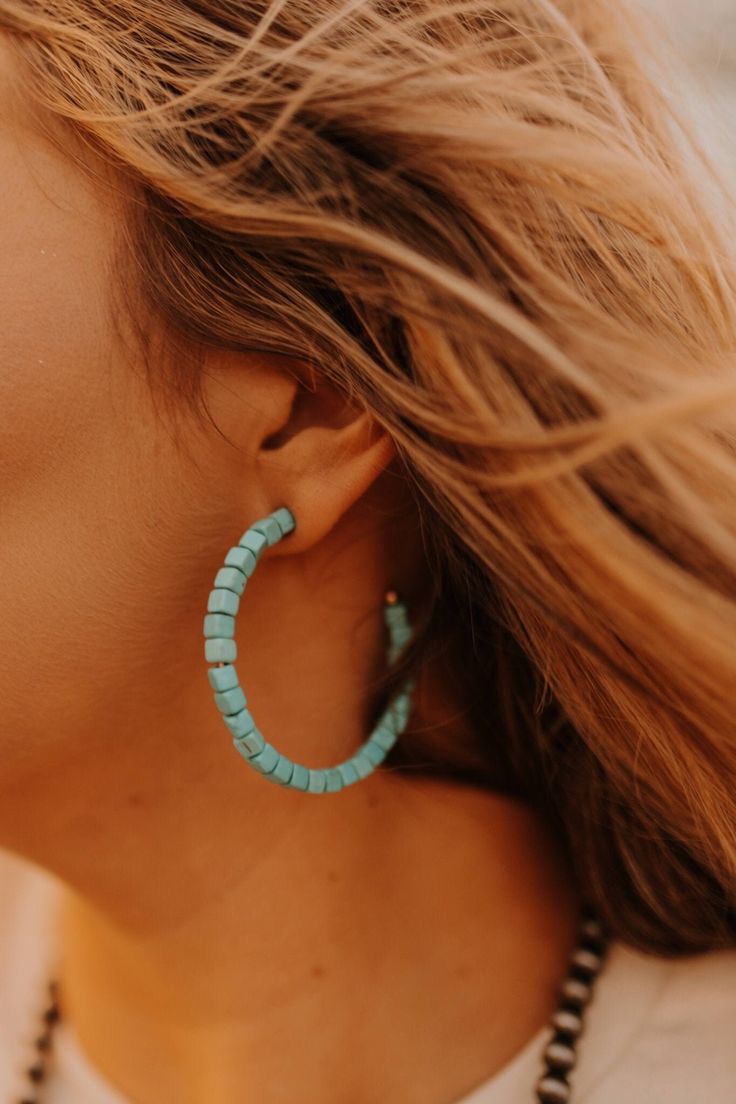 Everyone needs a favorite pair of hoops! Our Stacked Turquoise Hoop Earrings are large hoop earrings covered in square turquoise stones. Put these earrings on and dress up any outfit! Turquoise Hoop Earrings For Beach, Turquoise Hoop Earrings For Summer, Summer Turquoise Hoop Jewelry, Real Turquoise Jewelry, Turquoise Hoop Earrings, Turquoise Hoops, Real Turquoise, Turquoise Stones, Large Hoop Earrings