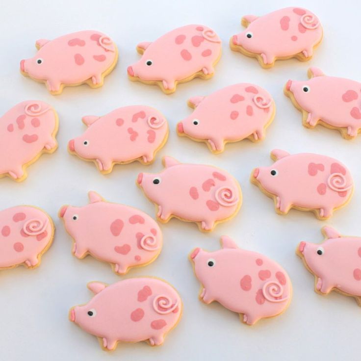 decorated cookies in the shape of pigs