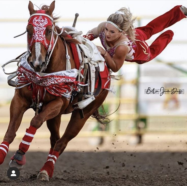 a woman riding on the back of a brown horse