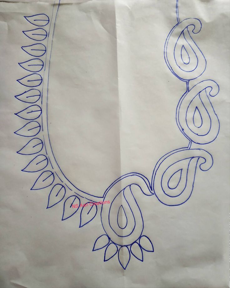 a white paper bag with blue writing on the front and bottom, along with an intricately designed necklace