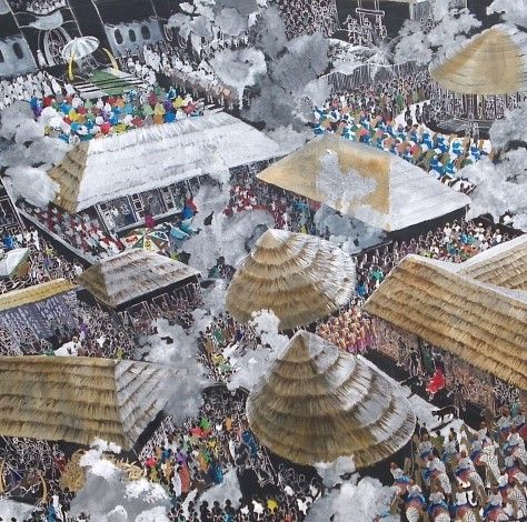 an aerial view of a village with thatched roofs and people in the foreground