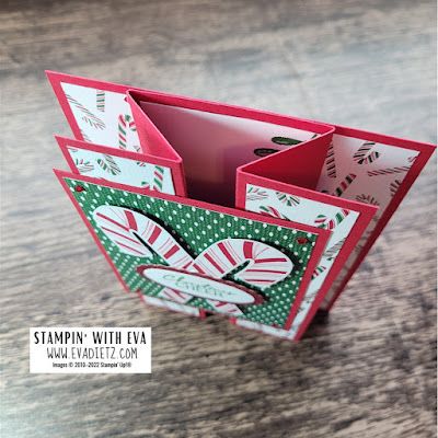 the inside of an origami christmas card holder