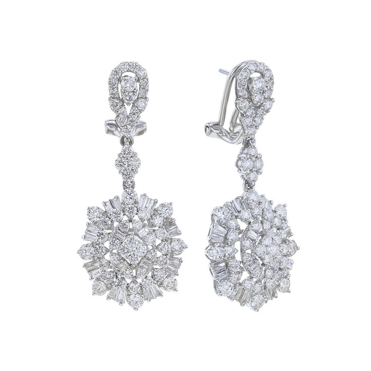 Take your style to new heights with the Alouette Diamond Drop Earrings. These opulent 18 karat gold earrings feature baguette cut and round brilliant diamonds totaling 3 1/6 carats, making them a statement of luxury and elegance. Elevate any outfit and turn heads with these stunning earrings.