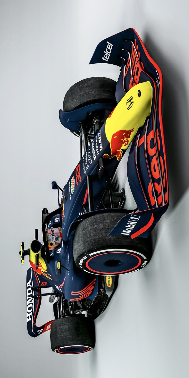 a red bull racing car hanging upside down