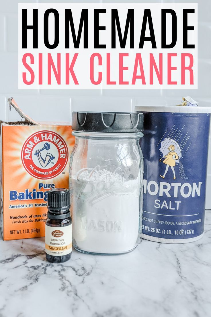 ingredients for homemade sink cleaner sitting on a marble counter with text overlay that says homemade sink cleaner