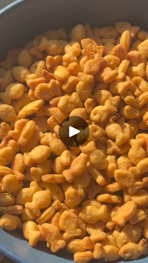 a bowl filled with corn flakes sitting on top of a table