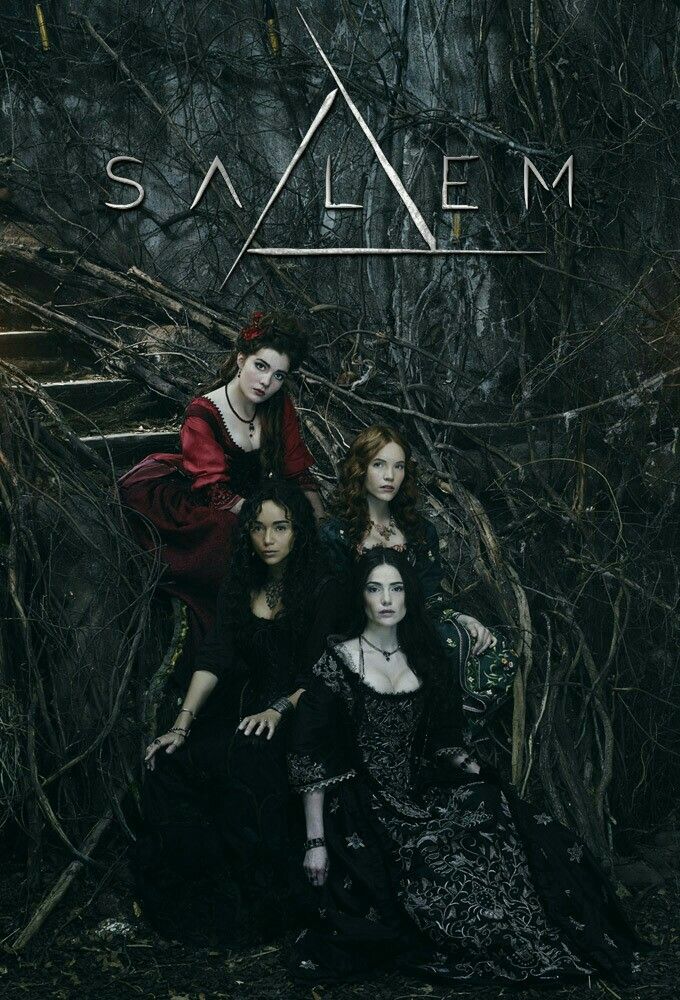 the cast of salem posing for a photo