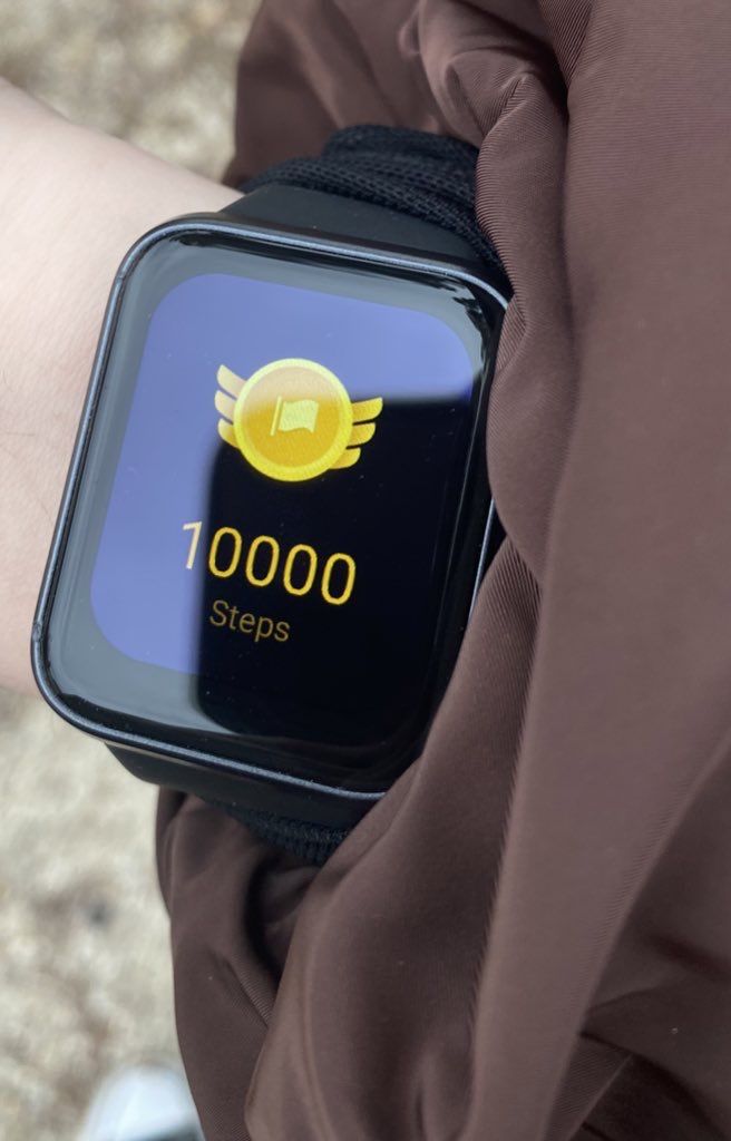 a close up of a person wearing a wrist watch with an app on the screen