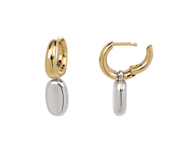 With their modern movement and combination of metals, these Kloto earrings are unlike anything in your collection. The polished 18K yellow gold hoops sit right under the ear and attach to 18K yellow gold latch backs. An oval, polished sterling silver drop dangles below for a hint of unexpected movement and contrast. total length : just under 7/8"18K yellow gold hoop width : 3mm to 4mmsterling silver drops : just under 1/2" x 1/4"18K yellow gold latch backs Classic Polished Dangle Hoop Earrings, Classic Dangle Hoop Earrings With Polished Finish, Modern Dangle Earrings With Polished Finish, Formal Dangle Hoop Earrings With Polished Finish, Timeless Dangle Earrings With Polished Finish, Formal Polished Finish Dangle Hoop Earrings, Formal Polished Dangle Hoop Earrings, Contemporary Small Hoop Earrings For Formal Occasions, Contemporary Small Hoop Earrings For Formal Events