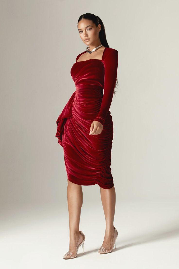 ‘Narin’ is just the epitome of elegance and class, Made from our ultra luxe velvet fabric in a maroon color, The bodice has our special corsetry boning to ensure the utmost support and gives the bust a lift for the ultimate cleavage. The skirt is gathered to the hip and we especially love the waterfall drape layer that drops down below the knee for an elegant finish.making it super flattering to the tummy and we love the thigh grazing split, revealing the perfect amount of skin. It has a zip to Red Velvet Dress Outfit, Maroon Cocktail Dress, Draped Midi Dress, Dress Maroon, Draped Midi Dresses, Maroon Dress, Fashion 101, Glam Dresses, Maroon Color