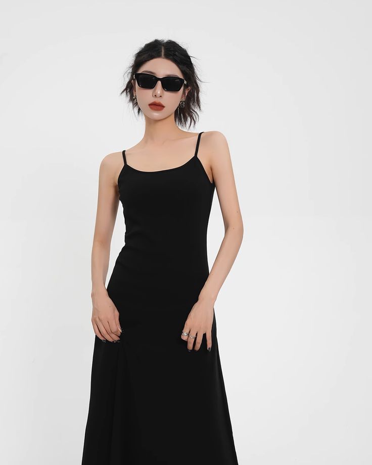 A cami dress with delicate shoulder straps that adds a feminine touch.

Comfortable to wear, made from materials that are smooth to the touch.

It can be used seasonally by pairing it with a cardigan, so it has great styling power.

◾️Model
Height/Weight：160cm(62.9in)/42kg(92.5lb)
Fitting Size：S

◾️Material
cotton 94%
spandex 6%






Cm
(inches)

Length
Chest


S
118(46.4)
68(26.7)


M
119(46.8)
72(28.3)


L
120(47.2)
76(29.9) Elegant Midi Dress With Built-in Bra, Spring Evening Midi Dress With Built-in Bra, Black Dress With Spaghetti Straps And Built-in Bra, Black Spaghetti Strap Dress With Built-in Bra, Chic Black Maxi Dress With Built-in Bra, Chic Spring Suspender Dress With Built-in Bra, Black Maxi Dress With Built-in Bra, Casual Camisole Dress With Built-in Bra, Black Mini Dress With Adjustable Straps For Formal Occasions