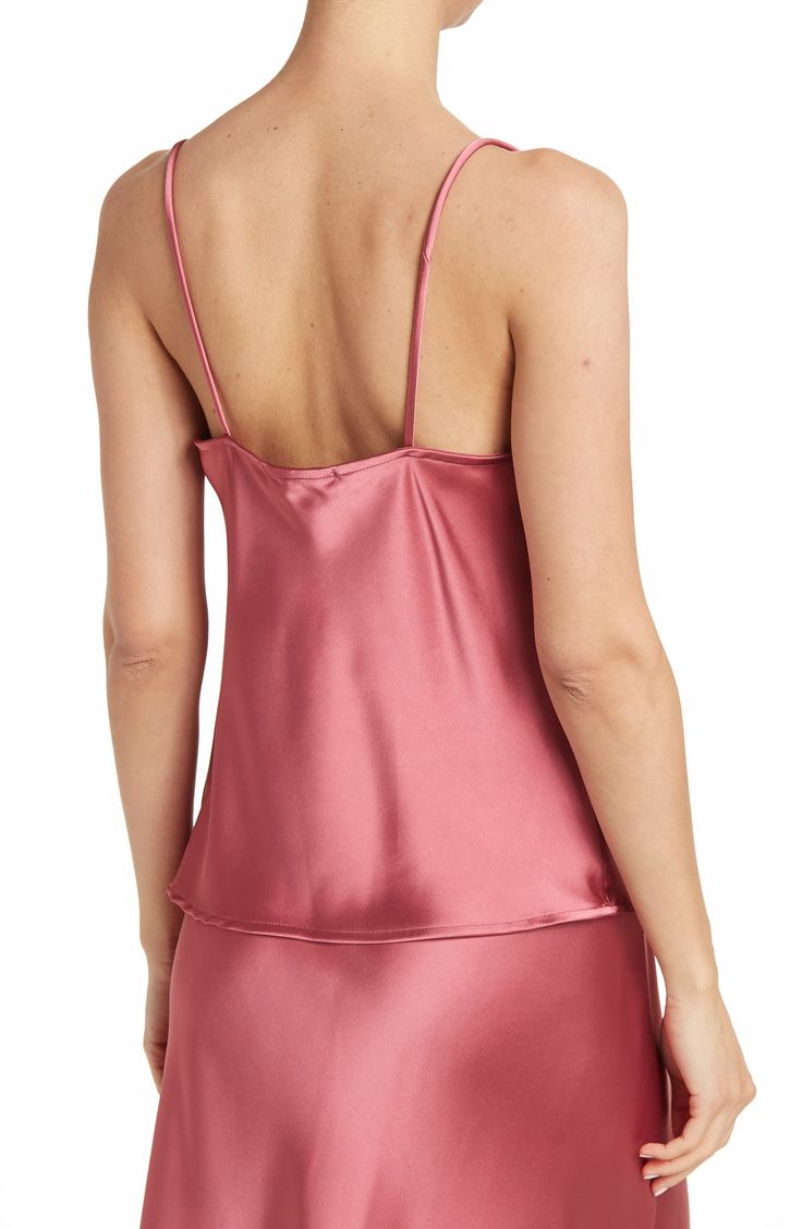 Constructed from smooth satin, a cowl-neck camisole lends elegant versatility to your date-night looks. 26" length (size S) Cowl neck Spaghetti straps Woven 97% polyester, 3% spandex Machine wash cold, line dry Made in the USA of imported materials Model stats: 5'10", 32" bust, 25" waist, 36" hip. Model is wearing size S. Satin Tank Top With Built-in Bra, Satin Camisole Top For Date Night, Satin Finish Camisole For Night Out, Fitted Sleeveless Satin Tank Top, Satin Camisole For Date Night, Fitted Satin Finish Sleeveless Tank Top, Solid Color Satin Camisole For Night Out, Fitted Cowl Neck Camisole For Night Out, Pink Silk Cami Top