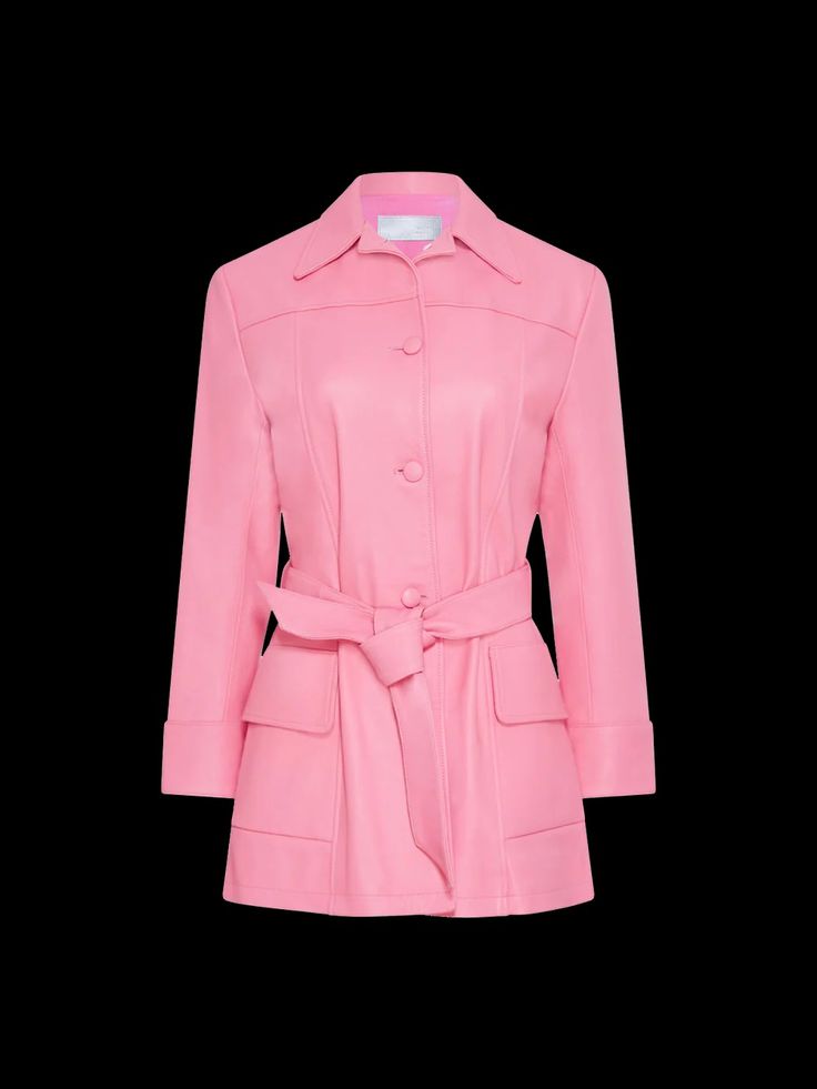 Constructed from supple pink leather, the Somerset trench is your quintessential statement outerwear. Complete with self-covered buttons and a belt that nips you in at the waist. The inside consists of a soft pink-to-red ombré lining, for a pop of color when worn open. The Short Trench silhouette is made to fit relaxed and tie tightly, so it can be easily layered over any outfit while retaining its flattering shape. Pink Lapel Collar Outerwear With Hidden Buttons, Luxury Pink Blazer With Lapel Collar, Luxury Pink Blazer With Notch Lapel, Pink Outerwear With Double Button And Lapel Collar, Luxury Pink Single Breasted Outerwear, Luxury Pink Single-breasted Outerwear, Formal Spring Outerwear With Self Belt, Pink Long Sleeve Business Outerwear, Pink Outerwear With Double Button Closure For Business