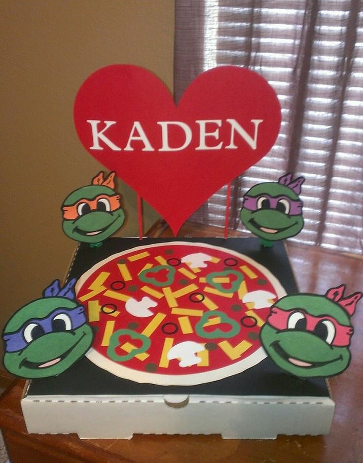 a cake that has been made to look like a pizza with the name kaden on it