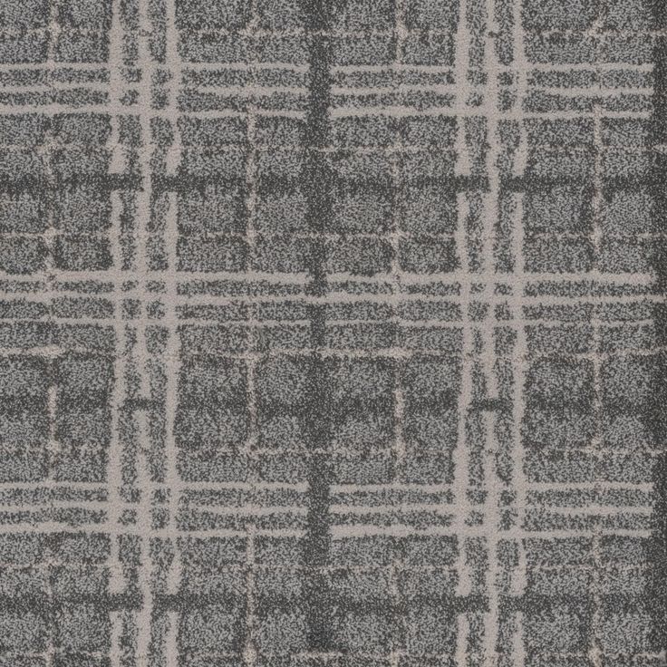 a gray and white rug with squares on it