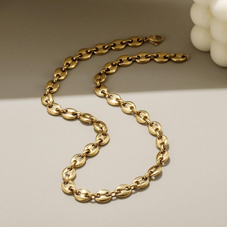 Sku: NSSN740STGC Details: This Coffee Bean Chain piece is a stunning, minimalistic, and sophisticated necklace. It works perfectly as a casual day-to-day item or for adding a unique charm to a special occasion outfit. Our beautiful pieces are made of a metal that is hypo-allergenic which is great for those with sensitive skin. Our pieces will not discolor, tarnish, rust, nor fade so you can wear them all day, every day! Length: 18.11" Package: *1×necklace *1×delicate gift box *1×polish cloth Metal Charm Necklaces With Gold Chain, Classic Metal Chain Necklace For Gift, Metal Necklaces For Everyday Use, Everyday Round Metal Necklace, Elegant Gold Alloy Chain Necklace, Minimalist Metal Jewelry With Chunky Chain, Minimalist Metal Chunky Chain Jewelry, Minimalist Alloy Charm Necklace With Delicate Chain, Trendy Metal Chain Necklace Tarnish Resistant