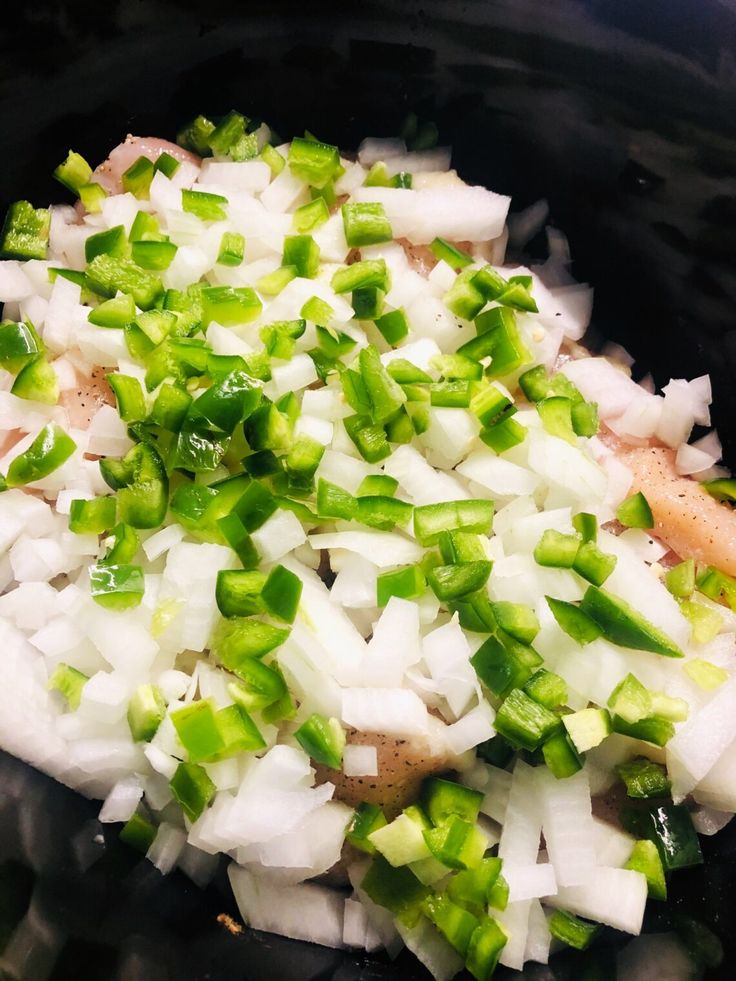 onions, celery and onion cooking in a slow cooker