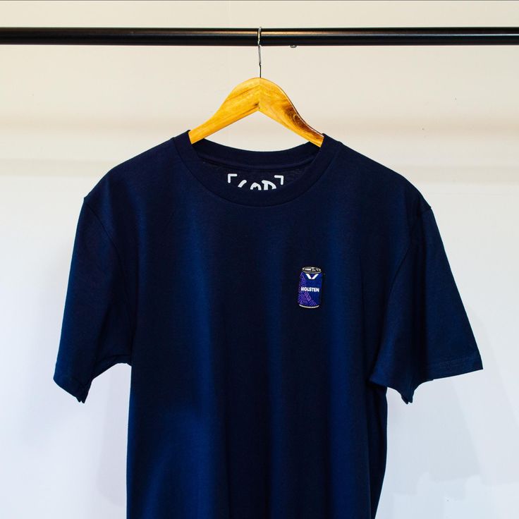 Celebrate your love for Tottenham with this stylish T-shirt featuring a unique embroidered patch inspired by the iconic 1994/95 away kit. The can design captures the essence of a classic era in Tottenham's history. Made from high-quality cotton, this T-shirt offers comfort and durability, perfect for everyday wear or showing off your team pride. It's an ideal addition to any Tottenham fan's wardrobe. Get yours today and relive the nostalgia! Size Guide: Small - Chest (To Fit): 34/36" / Length: 7 Crew Neck Tops With Embroidered Patch For Streetwear, Casual Blue Tops With Logo Patch, Blue Casual Tops With Logo Patch, Casual T-shirt With Embroidered Graphics For Fans, Casual Embroidered Graphics T-shirt For Fans, Crew Neck Top With Embroidered Logo For Fans, Sporty Tops With Embroidered Graphics For Fans, Cotton Crew Neck Top With Embroidered Patch, Cotton Graphic Tee With Logo Patch