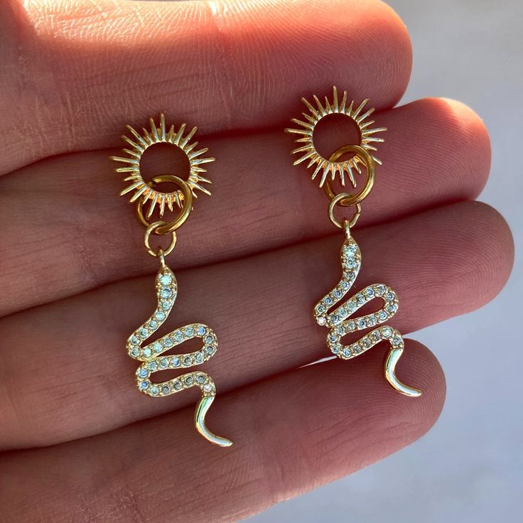 14k Gold Plated Over Brass Sun & Snake Stud Earrings. Yellow Gold With A Warm Undertone. Your Earrings Will Come Well Packaged And Gift-Ready In A Black Mesh Baggie. Drop: 40 Mm Length/Width: 40 Mm / 11 Mm Each Earring Weighs 1.6 Grams Gold Snake Earrings, Earrings Snake, Boho Celestial, Hello Kitty Earrings, Snake Ears, Wedding Earrings Studs, Boho Hoop Earrings, Wedding Studs, Sun Earrings