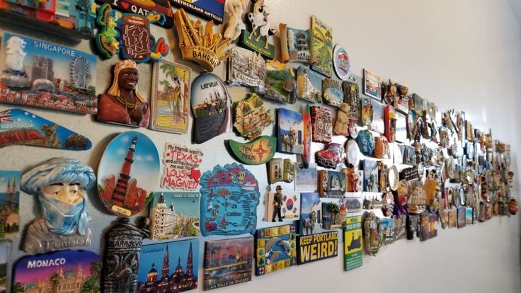 a wall with many different pictures on it