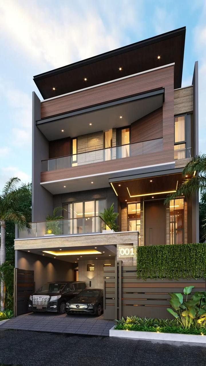 a car is parked in front of a two story house with an attached parking lot