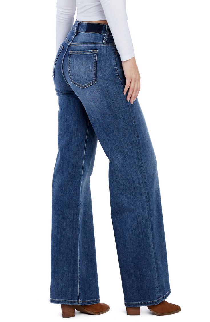 Baggy but not sloppy, these relaxed jeans have a high waist and floor-grazing hems for an elongated look, plus sustainably sourced fibers for a modern update. 32" inseam; 23 1/2" leg opening; 10 1/2" front rise; 15" back rise Zip fly with button closure Five-pocket style 66% cotton, 22% REPREVE® recycled polyester, 8% polyester, 3% rayon, 1% spandex REPREVE recycled polyester is made from 100% post-consumer recycled plastic bottles Machine wash, tumble dry Imported Medium Wash High Rise Relaxed Fit Flare Jeans, Relaxed Fit Flared Cropped Jeans, Relaxed Fit Jeans With Frayed Hem, Casual Flared Cropped Jeans In Relaxed Fit, Fall High Rise Flare Jeans With Relaxed Fit, Casual Flare Cropped Jeans With Relaxed Fit, High Rise Wide Leg Pants In Medium Wash, Relaxed Fit Wide Leg Flare Jeans In Medium Wash, Medium Wash Wide Leg Flare Jeans With Relaxed Fit