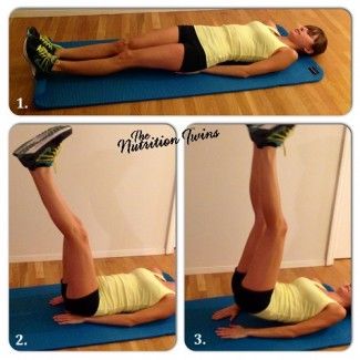 a woman doing an exercise on a mat with her legs up and hands in the air