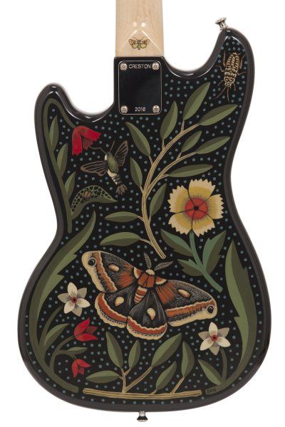 an electric guitar with butterflies and flowers on it