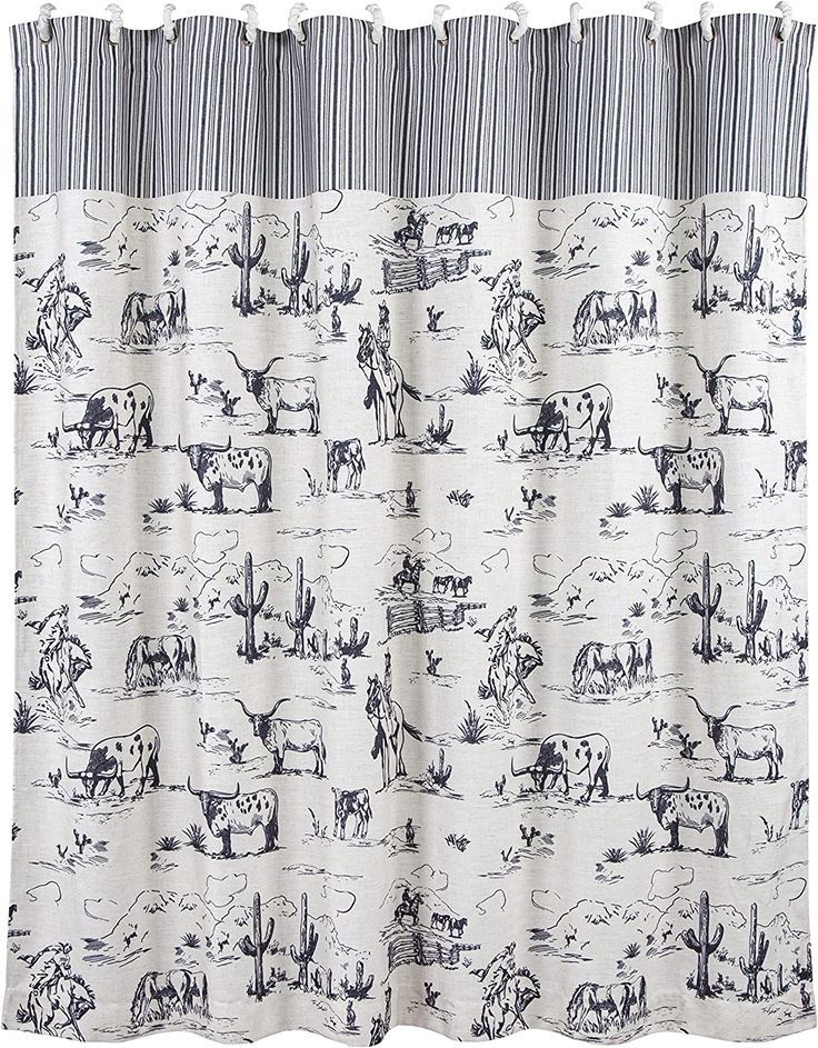 a shower curtain with black and white images on it, along with an animal theme