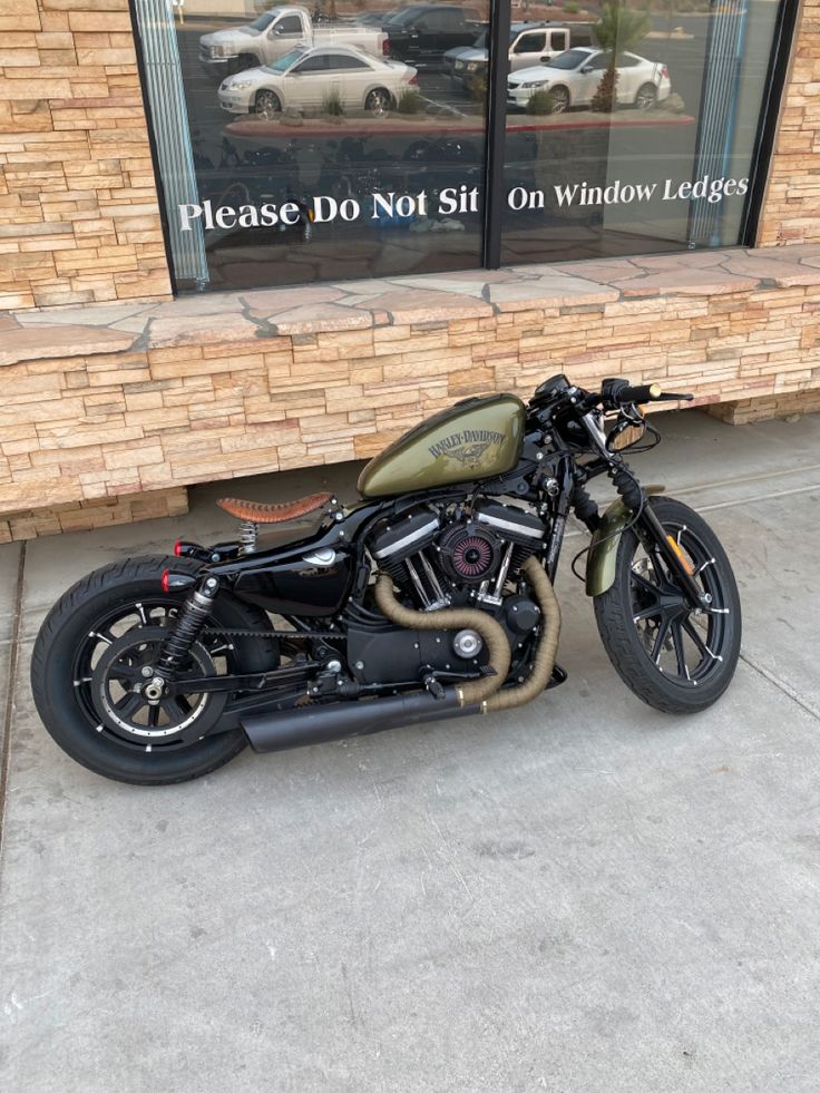 a motorcycle parked in front of a building