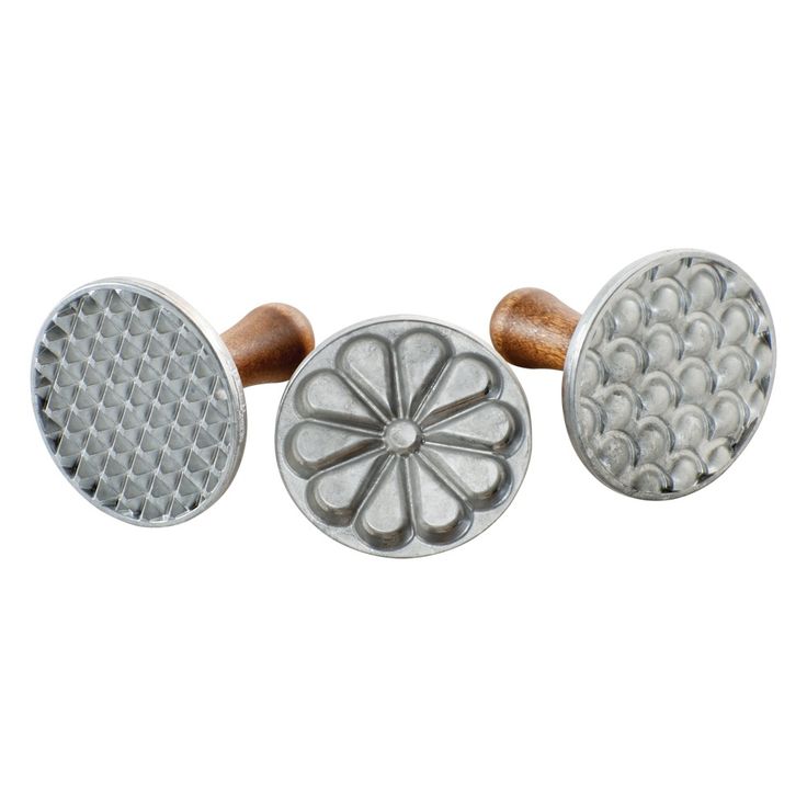 three different types of knobs on a white background and one has a flower design