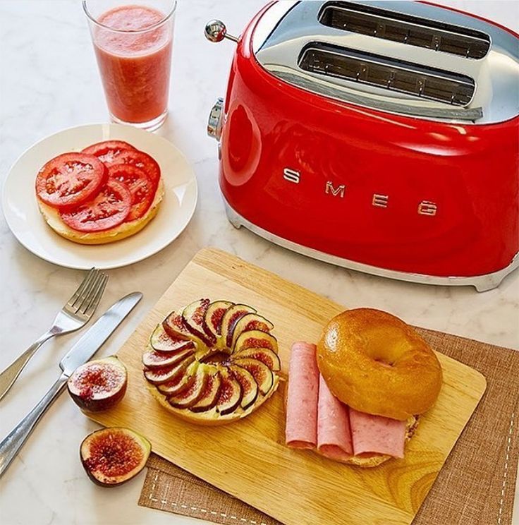 a toaster and some food on a table