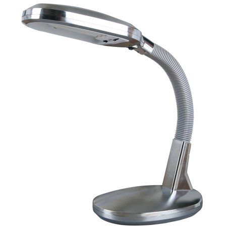 a silver desk lamp on a white background